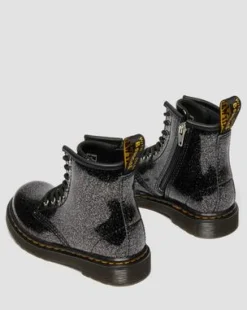 TAAPEROIDEN 1460 GLITTER-KIILTONAHKAMAIHARIT in Musta & Hopea